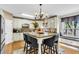 This well-equipped kitchen features a center island, plenty of counter space, and backyard views at 1185 Out Of Bounds Dr, Summerville, SC 29485