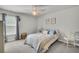 Inviting bedroom with soft lighting, window, and carpet floors at 119 Loon Dr, Summerville, SC 29483