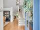 Welcoming foyer with hardwood floors, staircase, and a glimpse into the dining and living areas at 119 Loon Dr, Summerville, SC 29483