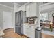 Well-equipped kitchen with stainless steel appliances and a view into the dining area at 119 Loon Dr, Summerville, SC 29483