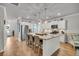 Spacious kitchen with white cabinetry, granite countertops, stainless steel appliances, and a large island at 119 Loon Dr, Summerville, SC 29483