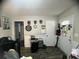 Functional entryway with stylish accents, including a dartboard and modern flooring for a welcoming space at 1206 Hawthorne Rd, Hanahan, SC 29410
