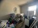 Picture of a storage room containing an electrical panel, freezer and some personal belongings, taken from a high angle at 1206 Hawthorne Rd, Hanahan, SC 29410