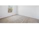 Neutral bedroom features carpet, white walls and trim, and a window at 121 Dotson St, Harleyville, SC 29448