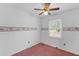 Bright bedroom with window and wallpaper border at 1215 Redeemer Dr, Hanahan, SC 29410