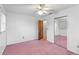 Cozy bedroom featuring a ceiling fan, closet, and ample natural light at 1215 Redeemer Dr, Hanahan, SC 29410