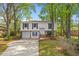 Charming two-story home boasts an attached garage and classic curb appeal at 1215 Redeemer Dr, Hanahan, SC 29410