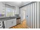 Charming kitchen featuring white cabinets, granite countertops, and stainless steel appliances at 1215 Redeemer Dr, Hanahan, SC 29410