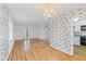 Spacious living area with hardwood floors, great light, and easy kitchen access at 1215 Redeemer Dr, Hanahan, SC 29410