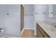 Bathroom featuring a walk-in shower, vanity with a sink and storage, and a toilet at 1318 Foster St, Charleston, SC 29407