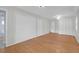 Spacious bedroom featuring hardwood floors and several closets for ample storage at 1318 Foster St, Charleston, SC 29407