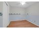 Bedroom with hardwood floors and blue and white wallpaper border at 1318 Foster St, Charleston, SC 29407