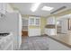 Traditional kitchen featuring white cabinetry and ample storage space with tile floors at 1318 Foster St, Charleston, SC 29407