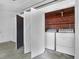 Laundry room with folding doors, washer, and dryer at 1318 Foster St, Charleston, SC 29407