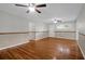 Large living room features ceiling fans, hardwood floors, and a neutral color palette at 1318 Foster St, Charleston, SC 29407