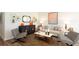 Comfortable living room featuring a modern cabinet, artwork and stylish decor at 139 Yarrow Way, Moncks Corner, SC 29461
