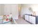 Inviting Bedroom with crib, dresser, and playful decor creates a warm space at 143 Yarrow Way, Moncks Corner, SC 29461