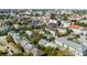 Overhead view showcasing the property nestled among mature trees in an urban environment at 15 N Adgers Wharf, Charleston, SC 29401
