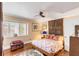 Cozy bedroom with hardwood floors, a bright window, and a comfortable bed, showcasing a relaxing and inviting space at 15 N Adgers Wharf, Charleston, SC 29401