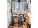 Cozy office space with hardwood floors, natural light, and built-in storage at 15 N Adgers Wharf, Charleston, SC 29401