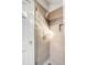 Walk-in shower with neutral tile, river rock floor, and modern fixtures at 15 N Adgers Wharf, Charleston, SC 29401