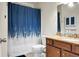 Bathroom with a shower featuring a decorative shower curtain, toilet, vanity with granite countertop, and wall mirror at 1502 Thoroughbred Blvd, Johns Island, SC 29455
