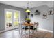 Dining area with neutral tones, views of the backyard, and stylish decor at 1502 Thoroughbred Blvd, Johns Island, SC 29455