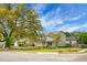 Traditional two-story home with a manicured lawn and classic architectural details at 1502 Thoroughbred Blvd, Johns Island, SC 29455