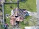 Aerial view of the home showcasing a well-manicured lawn and privacy fence at 1652 Lauda Dr, Mount Pleasant, SC 29464