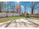 Large wooden deck in a private backyard with mature trees and lawn at 1652 Lauda Dr, Mount Pleasant, SC 29464