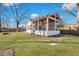 Enjoy the screened porch and backyard with beautiful landscaping and privacy fence at 1652 Lauda Dr, Mount Pleasant, SC 29464