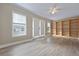 A well-lit room with a ceiling fan and a built-in bookshelf near the doorway at 1652 Lauda Dr, Mount Pleasant, SC 29464