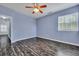Bedroom featuring wood-look floors, a window and a ceiling fan at 1652 Lauda Dr, Mount Pleasant, SC 29464
