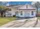 Attractive home showcasing a neatly landscaped front yard and inviting entrance at 1652 Lauda Dr, Mount Pleasant, SC 29464
