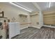 Functional laundry area with sink, white cabinets, and space for storage at 1652 Lauda Dr, Mount Pleasant, SC 29464
