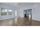 Open concept living room featuring wood-look flooring and entry to the kitchen at 1652 Lauda Dr, Mount Pleasant, SC 29464