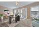 Bright home office with plenty of sunlight, modern furniture, and attractive decor at 1652 Lauda Dr, Mount Pleasant, SC 29464