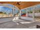 Bright sunroom with wood ceiling, white walls, and windows showcasing backyard views at 1652 Lauda Dr, Mount Pleasant, SC 29464