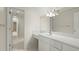Hall bathroom featuring bright lighting, tile flooring, and a vanity area at 1694 Jedburg Rd, Summerville, SC 29486