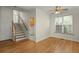 Entryway featuring staircase, hardwood floors, and natural light at 1694 Jedburg Rd, Summerville, SC 29486