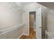 Spacious walk-in closet with metal shelving and hardwood floors; perfect for organization at 1694 Jedburg Rd, Summerville, SC 29486