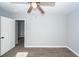 Bedroom with ceiling fan showcases new flooring and easy access to other rooms at 20 Stratton Dr, Charleston, SC 29420