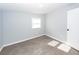 Bright bedroom features new flooring, fresh paint, and a window with lots of natural light at 20 Stratton Dr, Charleston, SC 29420