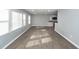 Bright and airy living room featuring large windows and modern wood-look flooring at 20 Stratton Dr, Charleston, SC 29420