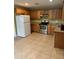 Kitchen with stainless steel appliances and wooden cabinets at 233 N Pandora Dr, Goose Creek, SC 29445