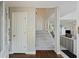 Bright foyer featuring hardwood floors, a staircase, and an open entryway, perfect for welcoming guests at 2345 Waring Hall Ln, Charleston, SC 29414