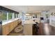 Bright, open kitchen with an island, hardwood floors, and plentiful countertop space at 2345 Waring Hall Ln, Charleston, SC 29414