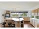 Spacious kitchen featuring stainless steel appliances, an island, and a window with scenic views at 2345 Waring Hall Ln, Charleston, SC 29414
