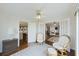 Charming living room with hardwood floors, ceiling fan, and access to multiple rooms at 2345 Waring Hall Ln, Charleston, SC 29414