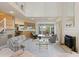 Inviting living room with fireplace, tall windows, and open floor plan, great for entertaining guests at 2345 Waring Hall Ln, Charleston, SC 29414